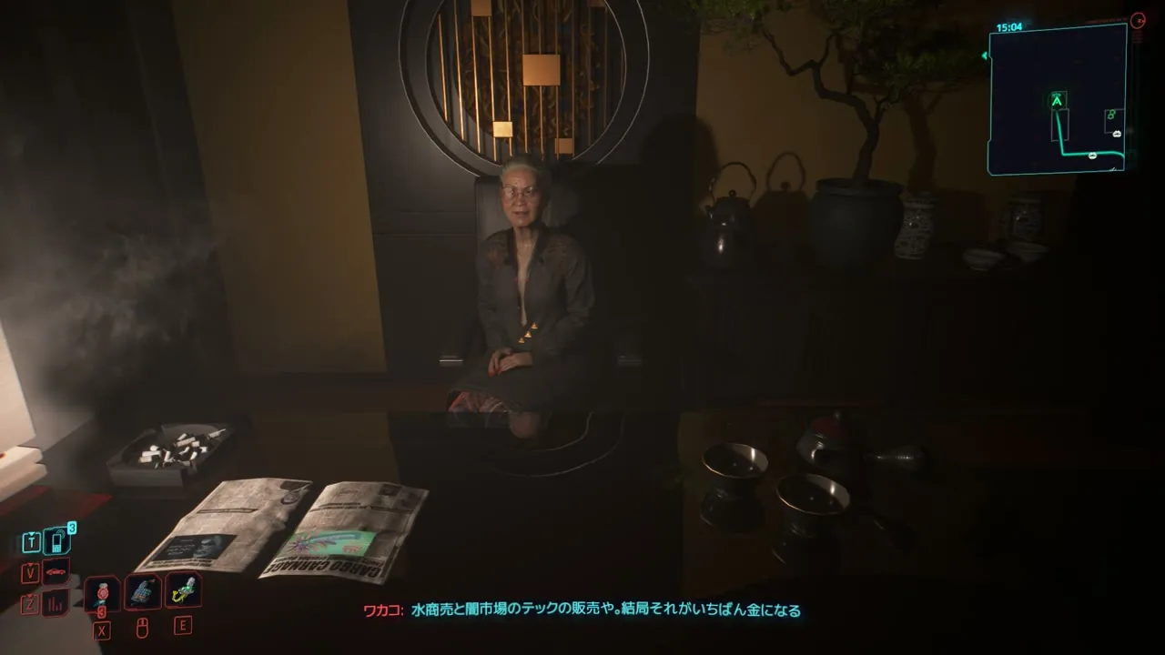 パチンコ屋の奥の部屋で椅子に座って話すワカコ・オカダ